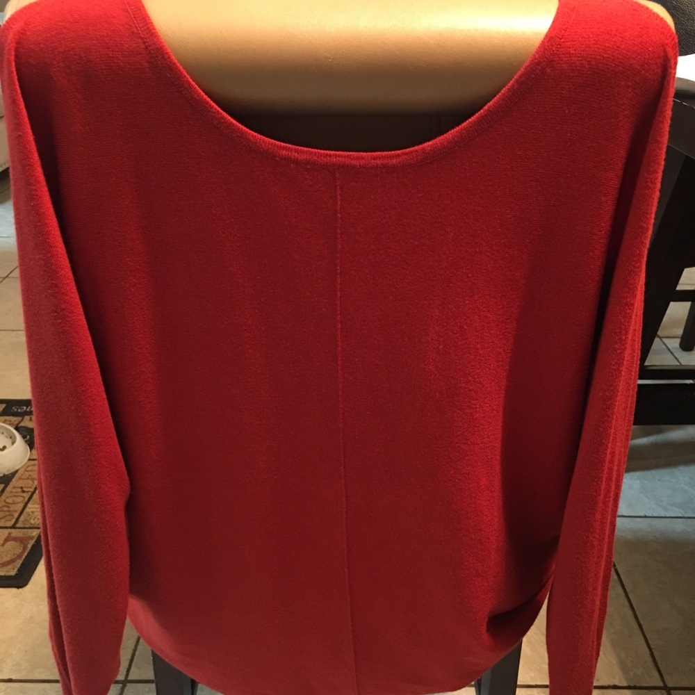 Maroon sweater with slit in shoulder